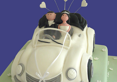 Bride and Groom in a car cake